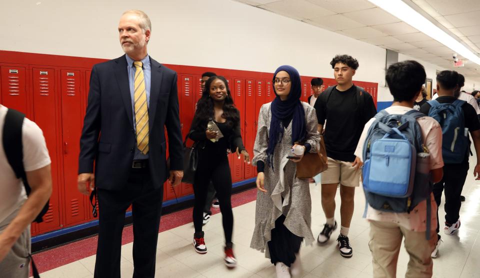 Principal Edward DeChent directs students on the first day of school at Roosevelt High School Ð Early College Studies Sept. 7, 2023.