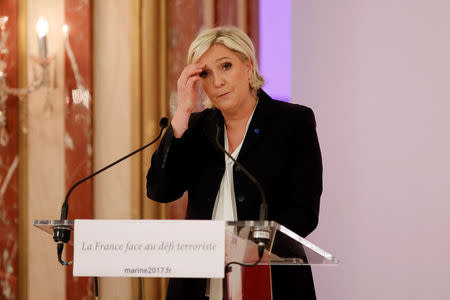 Marine Le Pen, French National Front (FN) political party leader and candidate for French 2017 presidential election, attends a news conference in Paris, France, April 10, 2017. REUTERS/Benoit Tessier