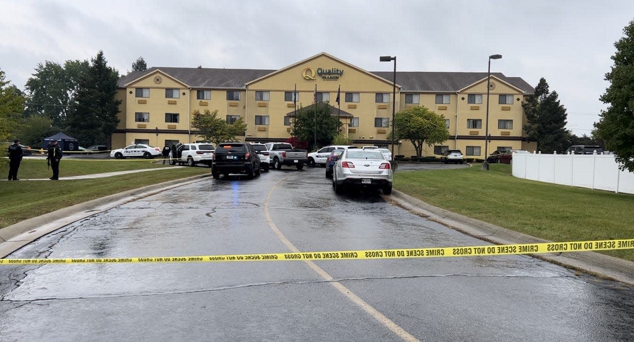 South Bend police investigate the scene at Quality Inn, 4124 Lincolnway West, where two people had apparent gunshot wounds on Thursday.