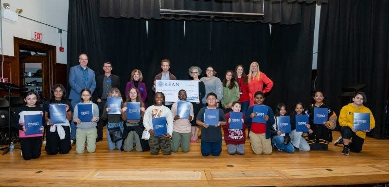 Students, teachers and staff at Roosevelt Elementary School joined representatives from Premiere Stages and the Northfield Bank Foundation to celebrate the conclusion of the playwrighting residency.