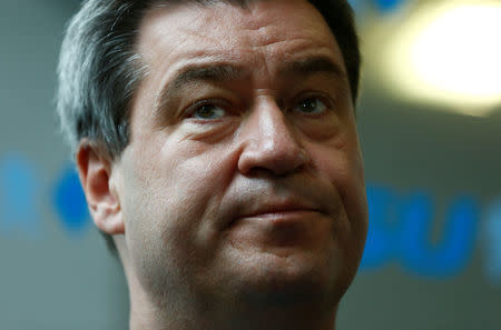 Bavarian Prime Minister Markus Soeder speaks to the media before a Christian Social Union (CSU) board meeting in Munich, Germany, June 18, 2018. REUTERS/Ralph Orlowski