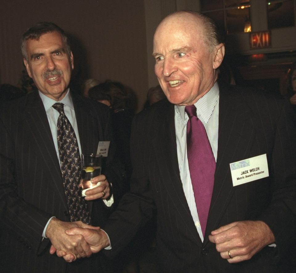 UNITED STATES - APRIL 19:  Time Warner chairman Gerald Levin (left) greets GE President Jack Welch at the New York Women in Communications 1999 Matrix Awards luncheon at the Waldorf-Astoria.  (Photo by Richard Corkery/NY Daily News Archive via Getty Images)