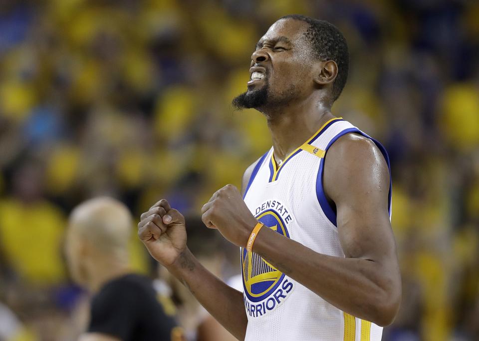 Kevin Durant is a champion in his first season with the Warriors. (AP)