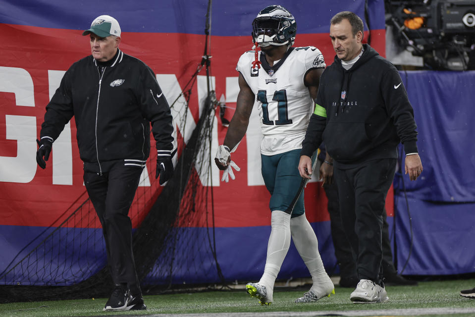Philadelphia Eagles wide receiver A.J. Brown (11) walks off the field with an injury during the first quarter of an NFL football game against the New York Giants, Sunday, Jan. 7, 2024, in East Rutherford, N.J. (AP Photo/Adam Hunger)
