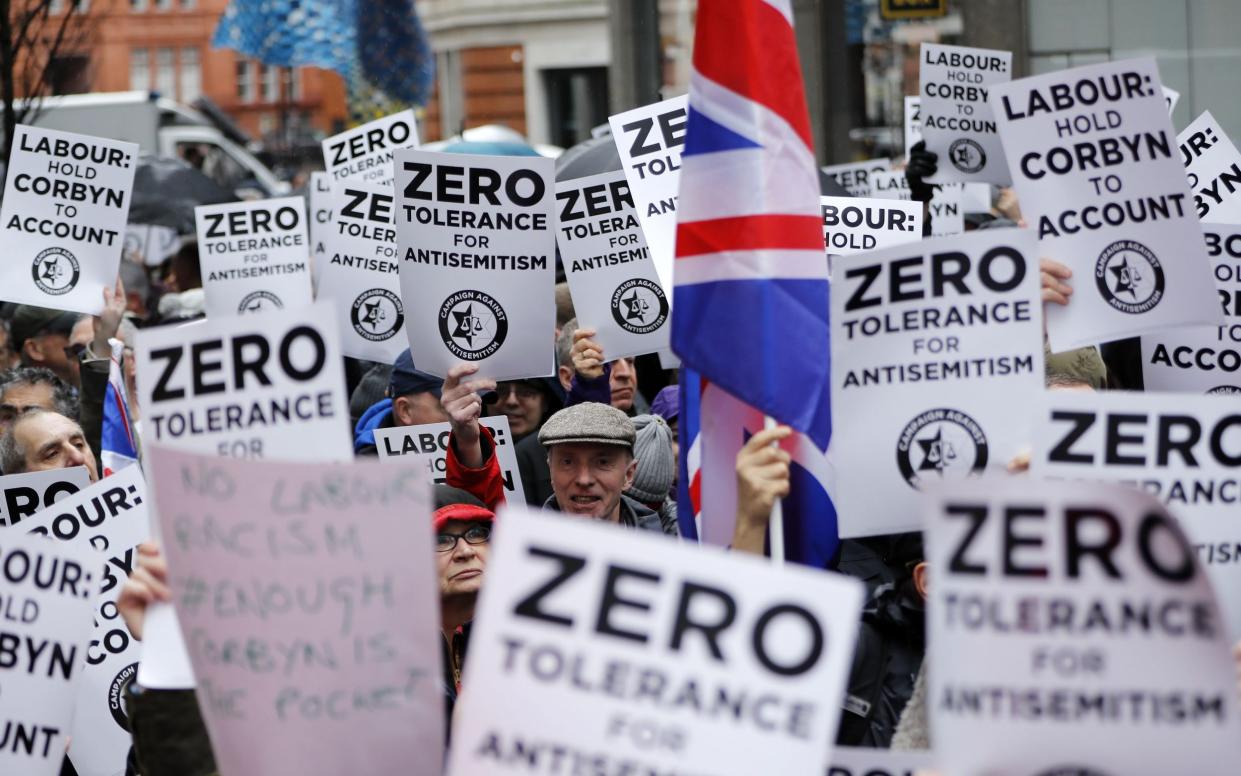 Protesters make they voices heard outside Labour's London headquarters in a demonstration organised by the Campaign Against Anti-Semitism as an anti-Semitism row engulfed the party in 2018