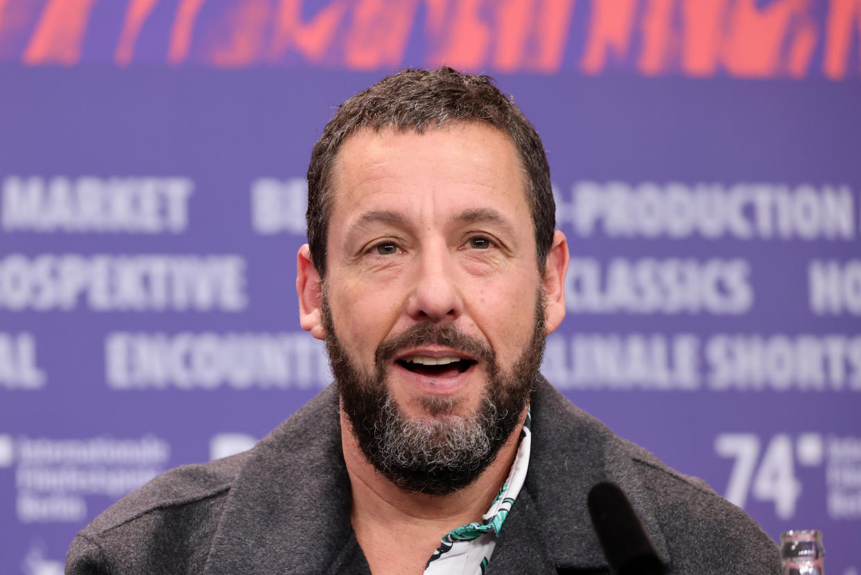 Adam Sandler spotted 'chilling' on a doorstep in London