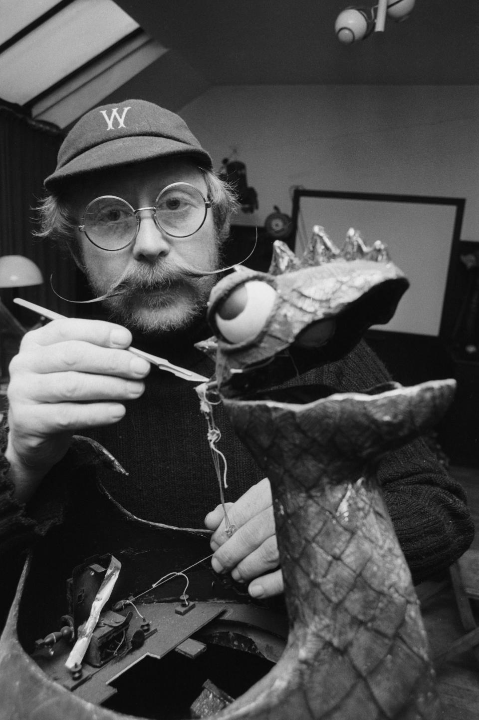 Wilf Lunn preparing for a performance of his music, sketches and illusion show, Wilf Lunn and The Lunnatix, at Covent Garden, 1978