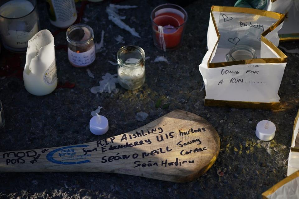 A message left on a hurling stick laid at the Grand Canal in Tullamore, Co Offaly, where Ashling Murphy was found dead. Ms Murphy was a keen camogie player (Niall Carson/PA) (PA Wire)