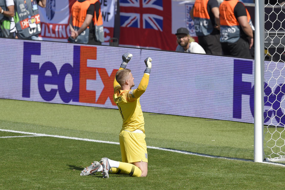 GUIMARAES, PORTUGAL - JUNE 09: Jordan Pickford of England celebrates after saving the decisive penalty from Josip Drmic of Switzerland during the UEFA Nations League Third Place Playoff match between Switzerland and England at Estadio D. Afonso Henriques on June 09, 2019 in Guimaraes, Portugal. (Photo by Octavio Passos - UEFA/UEFA via Getty Images)