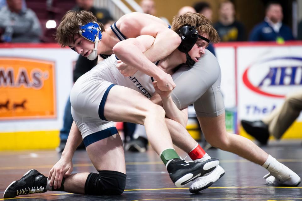 Littlestown's Cameron Mingee (front) wrestles Burgettstown's Gaven Suica in a 139-pound first round bout at the PIAA Class 2A Wrestling Championships at the Giant Center on March 7, 2024, in Hershey. Mingee won by decision, 4-3.