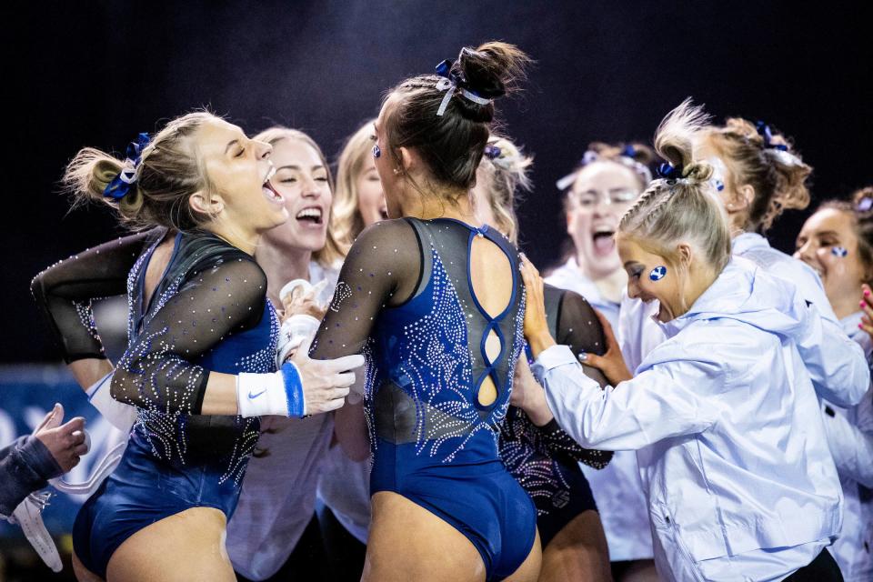 BYU gymnasts celebrate during meet against Utah State during the 2023 season. | Brooklynn Kelson, BYU Photo