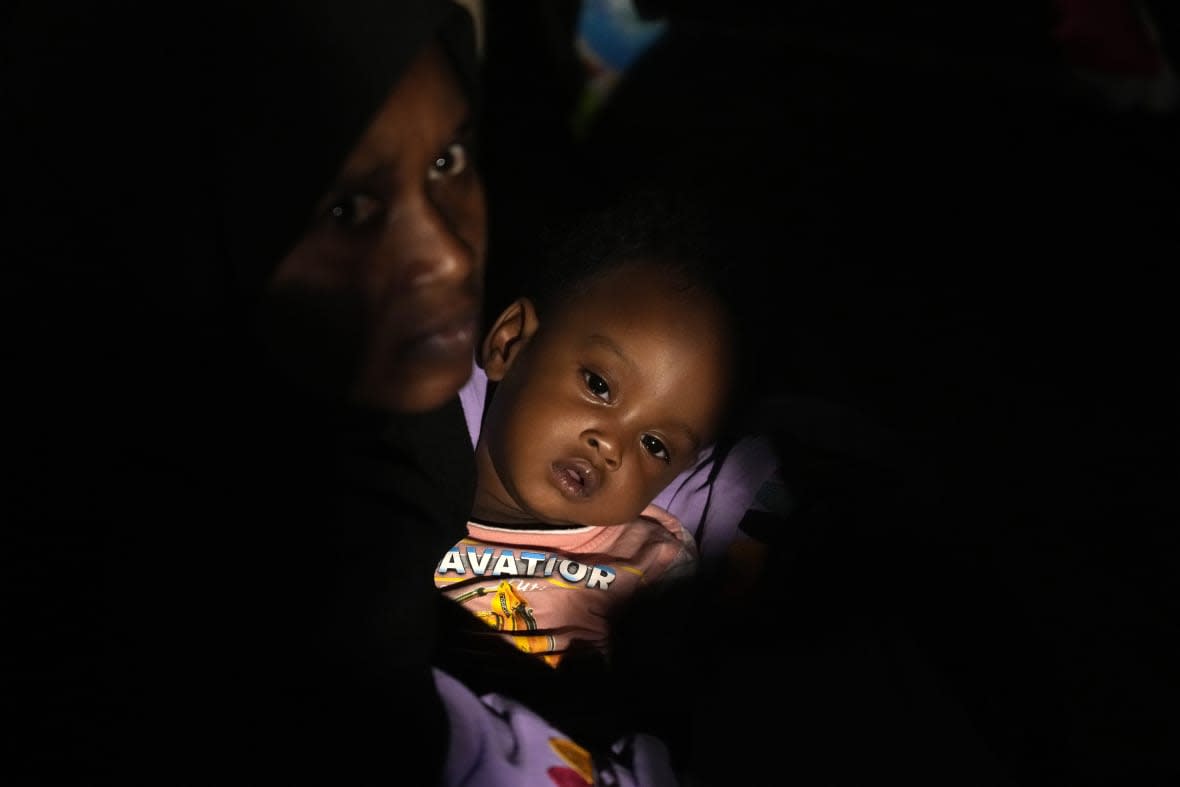 Sudanese evacuees wait before boarding a Saudi military ship to Jeddah port, at Port Sudan, Sudan, late Tuesday, May 2, 2023. (AP Photo/Amr Nabil, File)