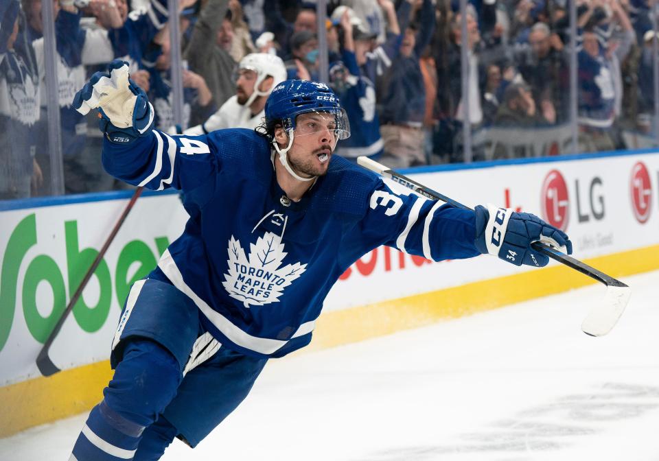 Toronto Maple Leafs center Auston Matthews celebrates scoring the winning goal against the Tampa Bay Lightning.