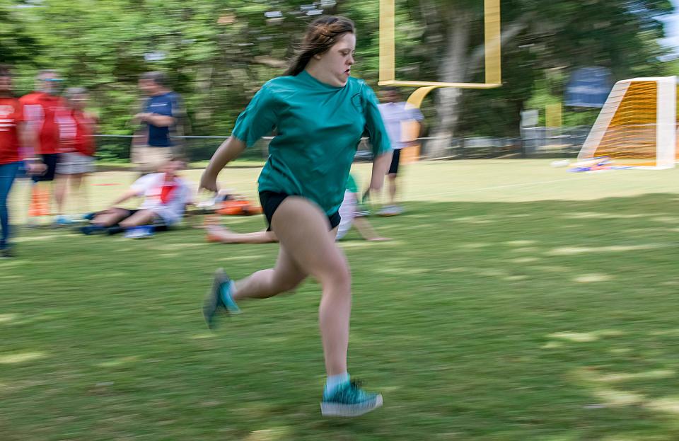 Caitlyn Williamson runs at the Susan Street Sports Complex in Leesburg on Saturday, May 7, 2022. [PAUL RYAN / CORRESPONDENT]