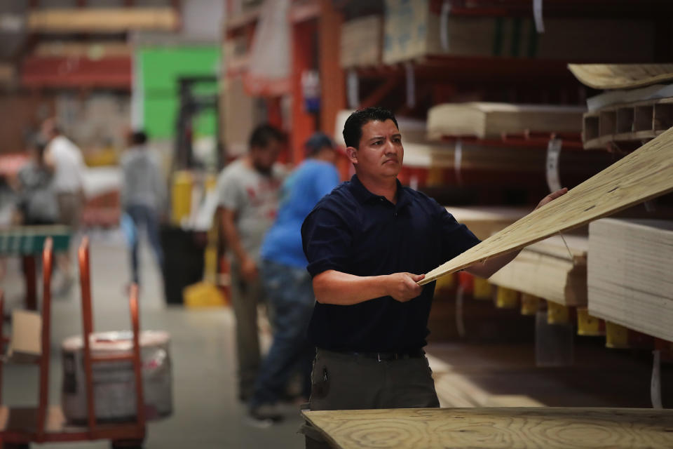 Customers shop at a Home Depot store in Chicago, Illinois. (Photo by Scott Olson/Getty Images)