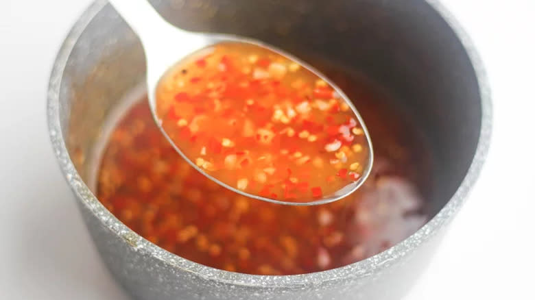 Sweet chili sauce on spoon