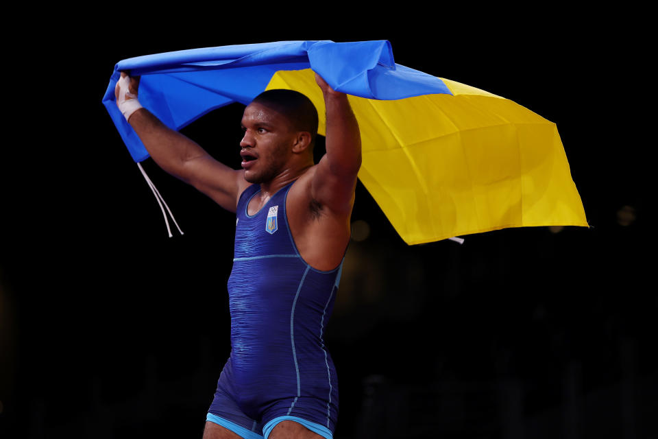 Zhan Beleniuk of Team Ukraine celebrates with country's flag