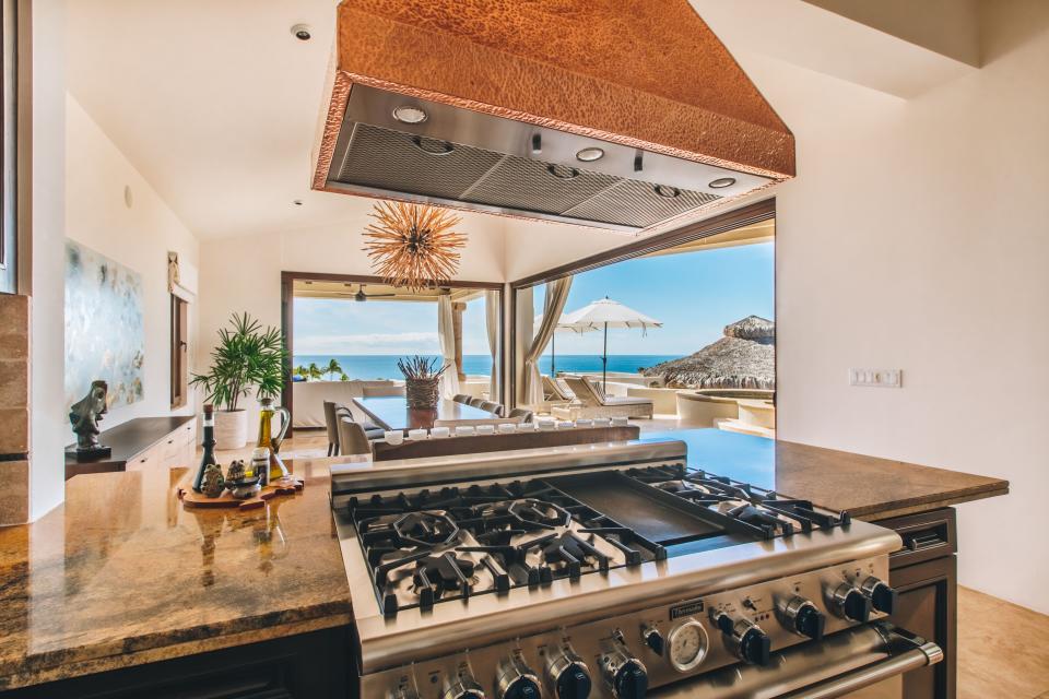 The lush marble kitchen at Casa Escondida.