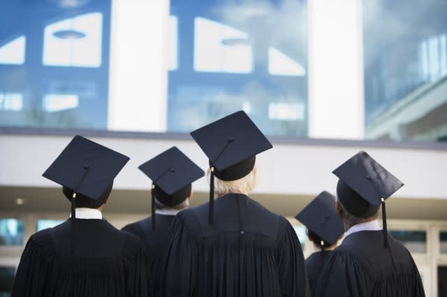 Graduates Wearing Caps and Gowns