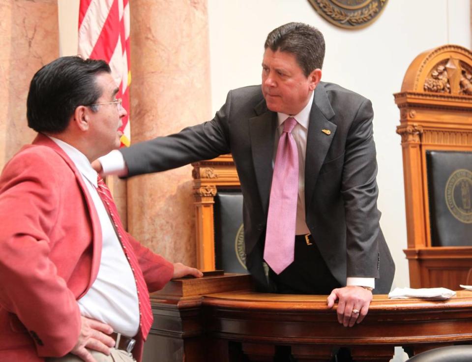 Speaker of the House Greg Stumbo, left, talked with Rep. Brent Yonts (D), Muhlenburg, as legislators return to session at the State Capital in Frankfort, Ky., on Tuesday, February 3, 2009. Photo by David Stephenson | Staff