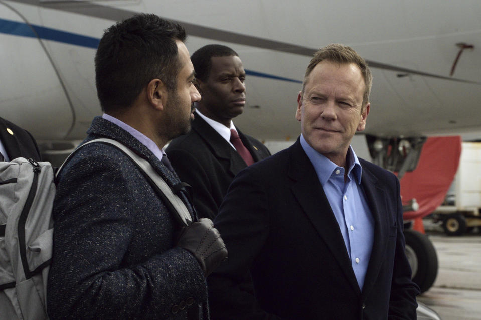 This image released by Netflix shows Kal Penn as Seth Wright, left, and Kiefer Sutherland as Tom Kirkman in "Designated Survivor," created by David Guggenheim. Netflix revived “Designated Survivor” for a single 10-episode season after it was canceled by ABC, but opted not to renew it for a fourth season. The show’s top producer says he was not surprised at the decision because Netflix, which offered him greater creative freedom than the network, was upfront that the show would have to clear a high bar to get a renewal. (Courtesy of Netflix via AP)