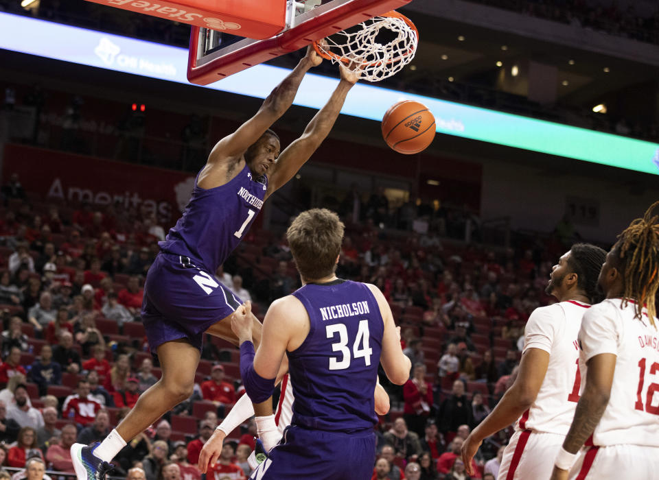 Northwestern's Chase Audige (1) dunks against Nebraska during the second half of an NCAA college basketball game Wednesday, Jan. 25, 2023, in Lincoln, Neb. (AP Photo/Rebecca S. Gratz)