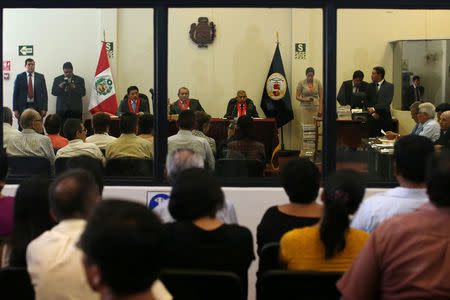 Former Shining Path leader Abimael Guzman and other Shining Path members attend a trial at a high security naval prison in Lima February 28, 2017. REUTERS/Guadalupe Pardo