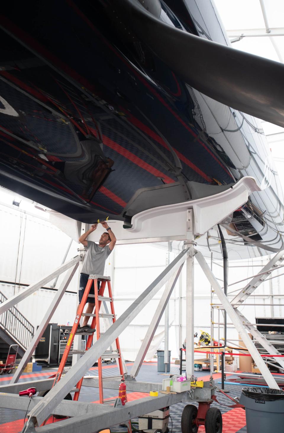 The American Magic team prepares for the America's Cup at their Port of Pensacola facilities on Friday.