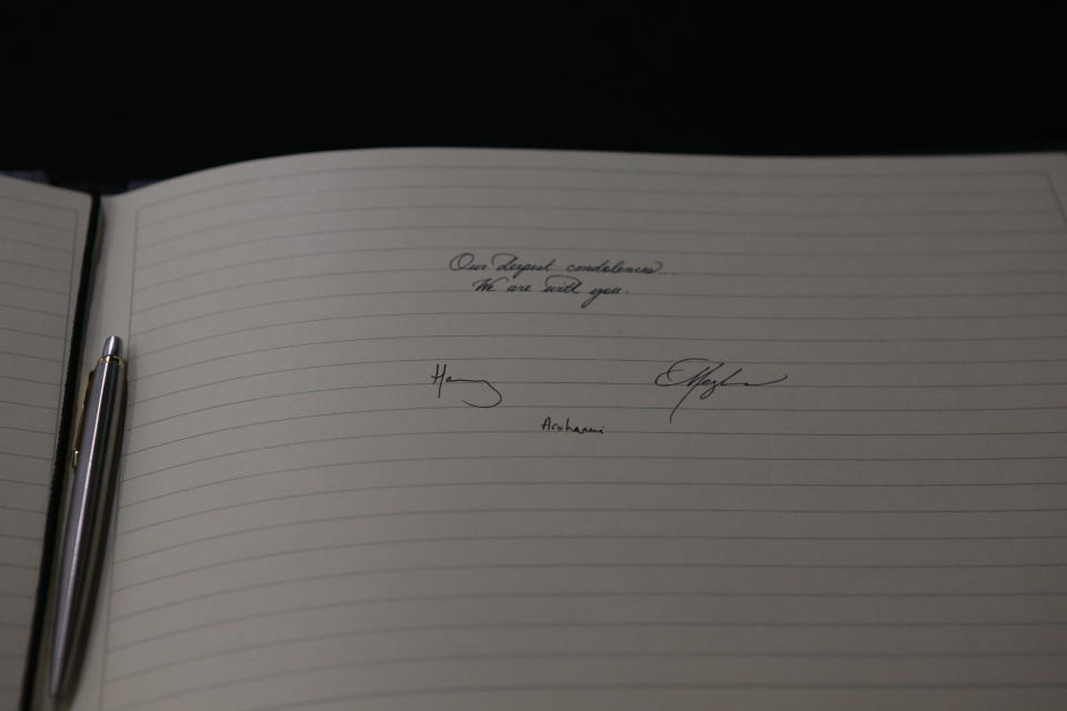 Harry and Meghan's signatures in the book of condolences.&nbsp; (Photo: WPA Pool via Getty Images)