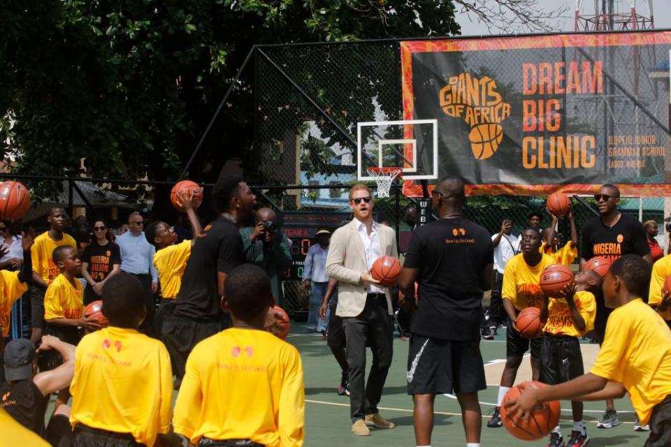 britains prince harry c, duke of sussex, takes part in a basketball exhibition training match at ilupeju grammar school in lagos on may 12, 2024 as he and britains meghan unseen, duchess of sussex visit nigeria as part of celebrations of invictus games anniversary photo by kola sulaimon afp photo by kola sulaimonafp via getty images