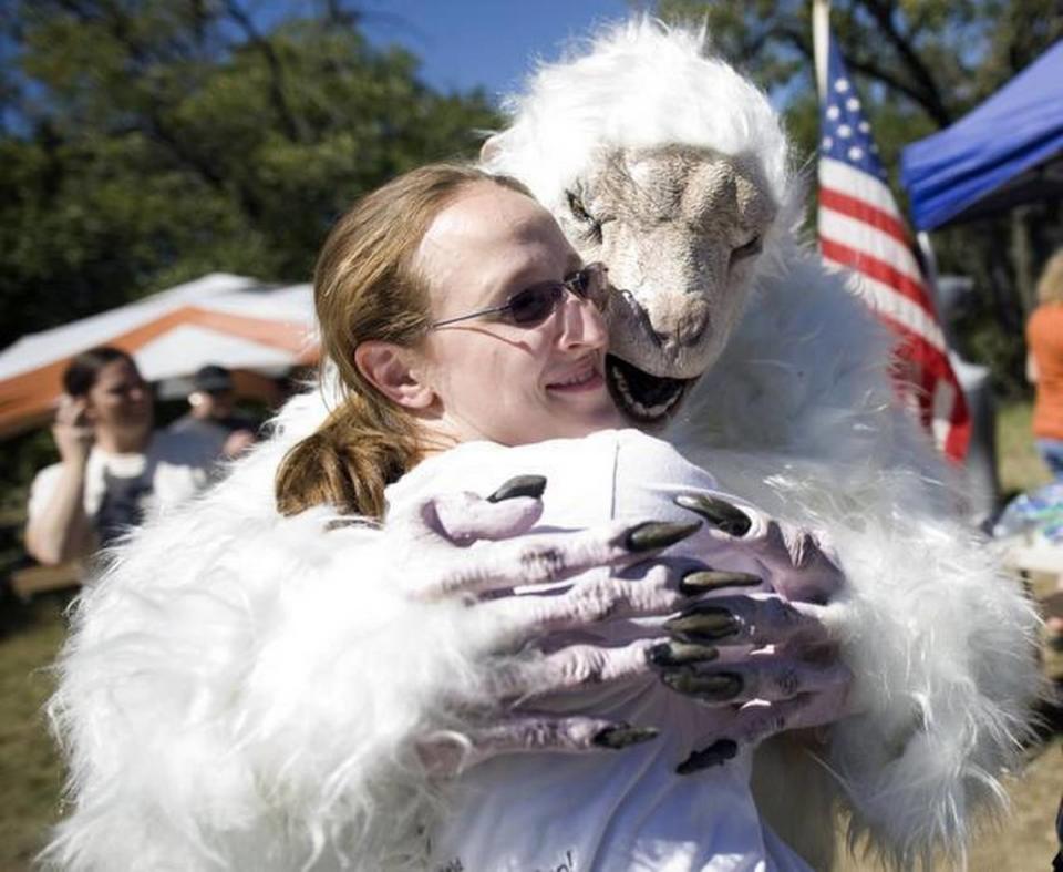 In 2010, a Lake Worth Monster Bash featured a Monster/Goat-Man in costume, here hugging Anna Sparks of Bedford.