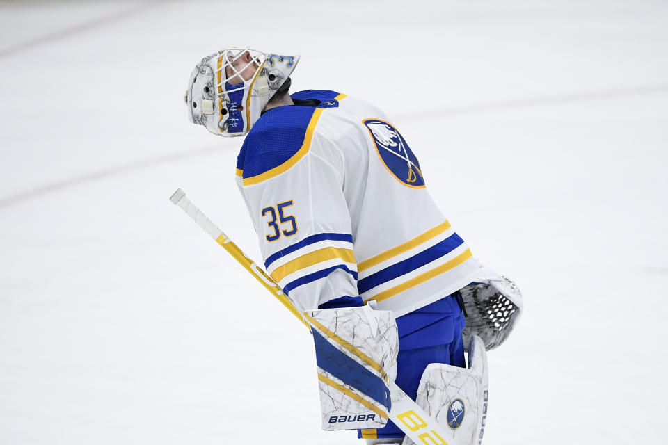 Buffalo Sabres goaltender Linus Ullmark (35) reacts after an NHL hockey game against the Washington Capitals, Sunday, Jan. 24, 2021, in Washington. The Sabres won 4-3 in a shootout. (AP Photo/Nick Wass)