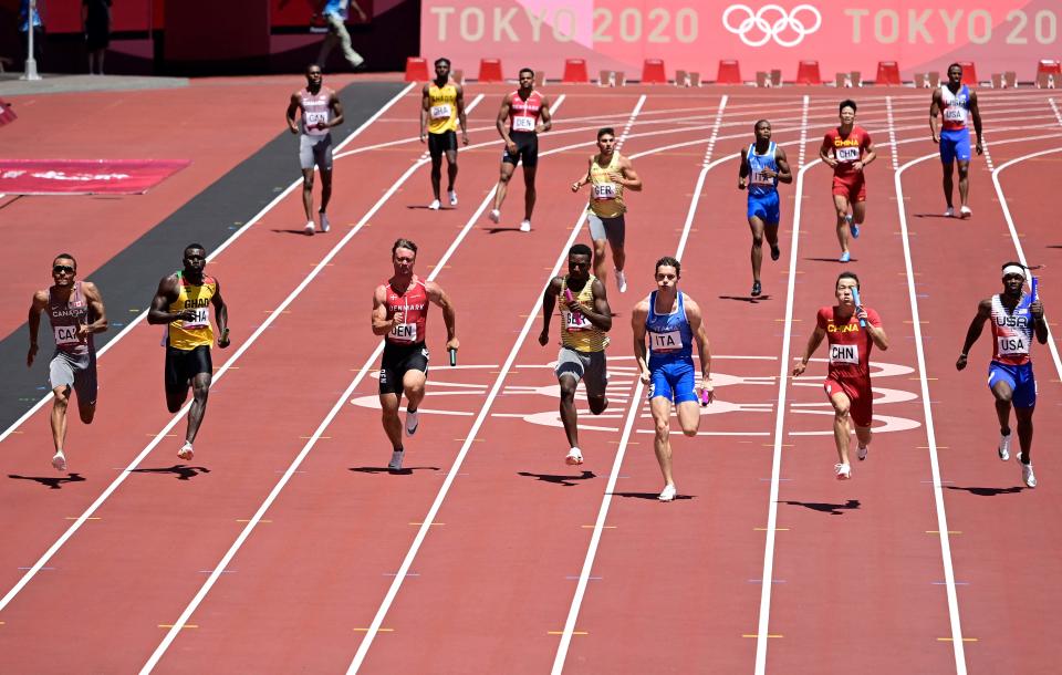 The U.S. men, far right lane, finished sixth in their semifinal heat in the 4x100 relay and did not qualify for the final.