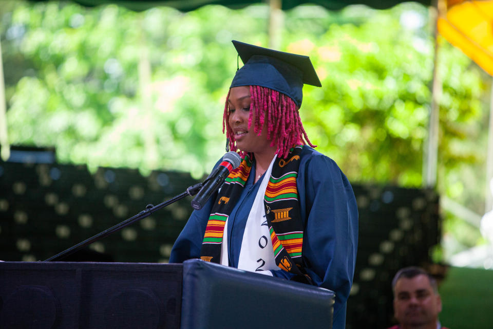 Class orator Isley Wilson makes a speech during the Cohasset High School commencement at the South Shore Music Circus on Saturday, June 4, 2022.