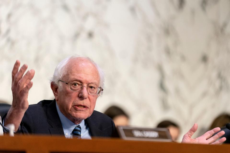 Senator Bernie Sanders, an Independent from Vermont, speaks to Stephane Bancel, CEO and director of Moderna, Inc., during the Senate Health, Education, Labor, and Pensions Committee on the price of Covid vaccines, on Capitol Hill in Washington, DC, on March 22, 2023. (Photo by Stefani Reynolds / AFP) (Photo by STEFANI REYNOLDS/AFP via Getty Images)