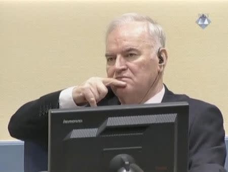 Ex-Bosnian Serb wartime general Ratko Mladic reacts in court at the International Criminal Tribunal for the former Yugoslavia (ICTY) in the Hague, Netherlands in this still image taken from a video released by the International Criminal Tribunal for the former Yugoslavia (ICTY), November 22, 2017. International Criminal Tribunal for the former Yugoslavia (ICTY)/Handout via REUTERS