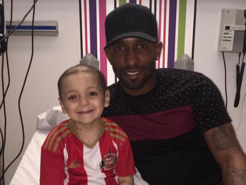 Bradley poses with his favourite player Jermain Defoe