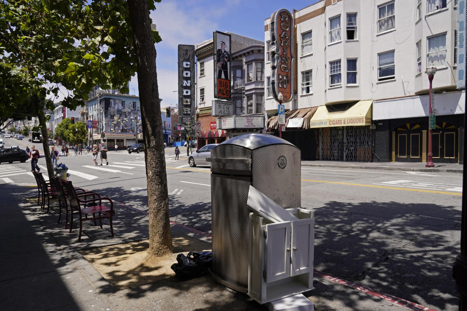 A prototype trash can called Soft Square is seen on Broadway Street in the North Beach area of San Francisco on July 26, 2022. What takes years to make and costs more than $20,000? A trash can in San Francisco. The pricey, boxy bin is one of three custom-made trash cans the city is testing this summer as part of its yearslong search for another tool to fight its battle against dirty streets. (AP Photo/Eric Risberg)