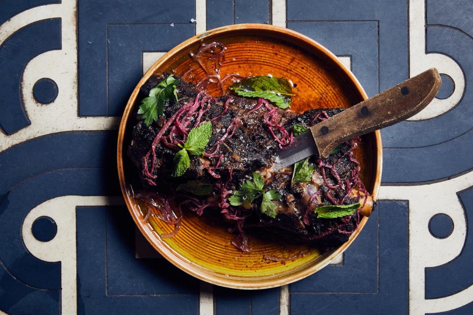 <h1 class="title">Slow-Roast Spiced Lamb Shoulder with Sumac Onions</h1><cite class="credit">Photo by Michael Graydon & Nikole Herriott</cite>