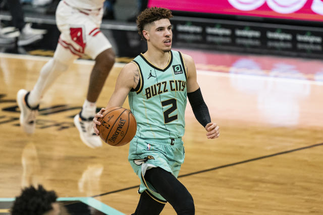 Charlotte Hornets guard LaMelo Ball (1) brings the ball up court