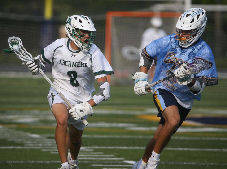 Archmere's Alex Im moves toward the net as Cape Henlopen's Henry D'Ambrogi pursues in Cape Henlopen's 13-6 win in a DIAA state high school tournament semifinal at Abessinio Stadium Wednesday, June 1, 2022.