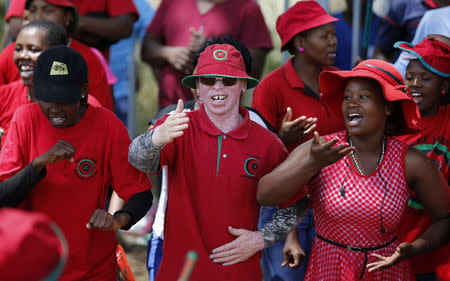 Supporters of the Democratic Congress (DC) party chant slogans in the capital Maseru February 26, 2015. REUTERS/Siphiwe Sibeko