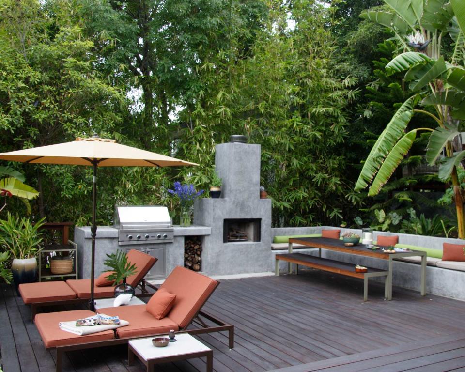 <p> Go contemporary with your decking and pair a rustic, wooden (or wooden-effect) finish underfoot with industrial-style concrete counters and a sleek grill. The result is sure to make a statement. </p> <p> Add architectural greenery around the scene &#x2013; either in borders or oversized planters &#x2013; for that tropical garden vibe. A pair of sun loungers are always a good addition to an outdoor living space too, for a spot of post-lunch relaxing. </p>