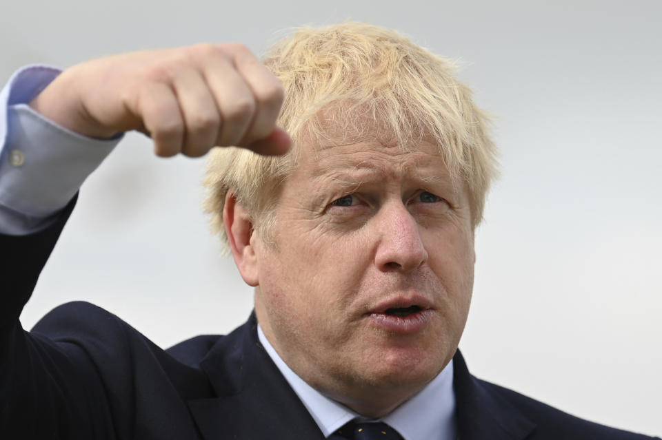 Britain's Prime Minister Boris Johnson visits the NLV Pharos, a lighthouse tender moored on the river Thames, to mark London International Shipping Week in London, Thursday, Sept. 12, 2019. The British government insisted Thursday that its forecast of food and medicine shortages, gridlock at ports and riots in the streets after a no-deal Brexit is an avoidable worst-case scenario, as Prime Minister Boris Johnson denied misleading Queen Elizabeth II about his reasons for suspending Parliament just weeks before the country is due to leave the European Union. (Daniel Leal-Olivas/Pool photo via AP)