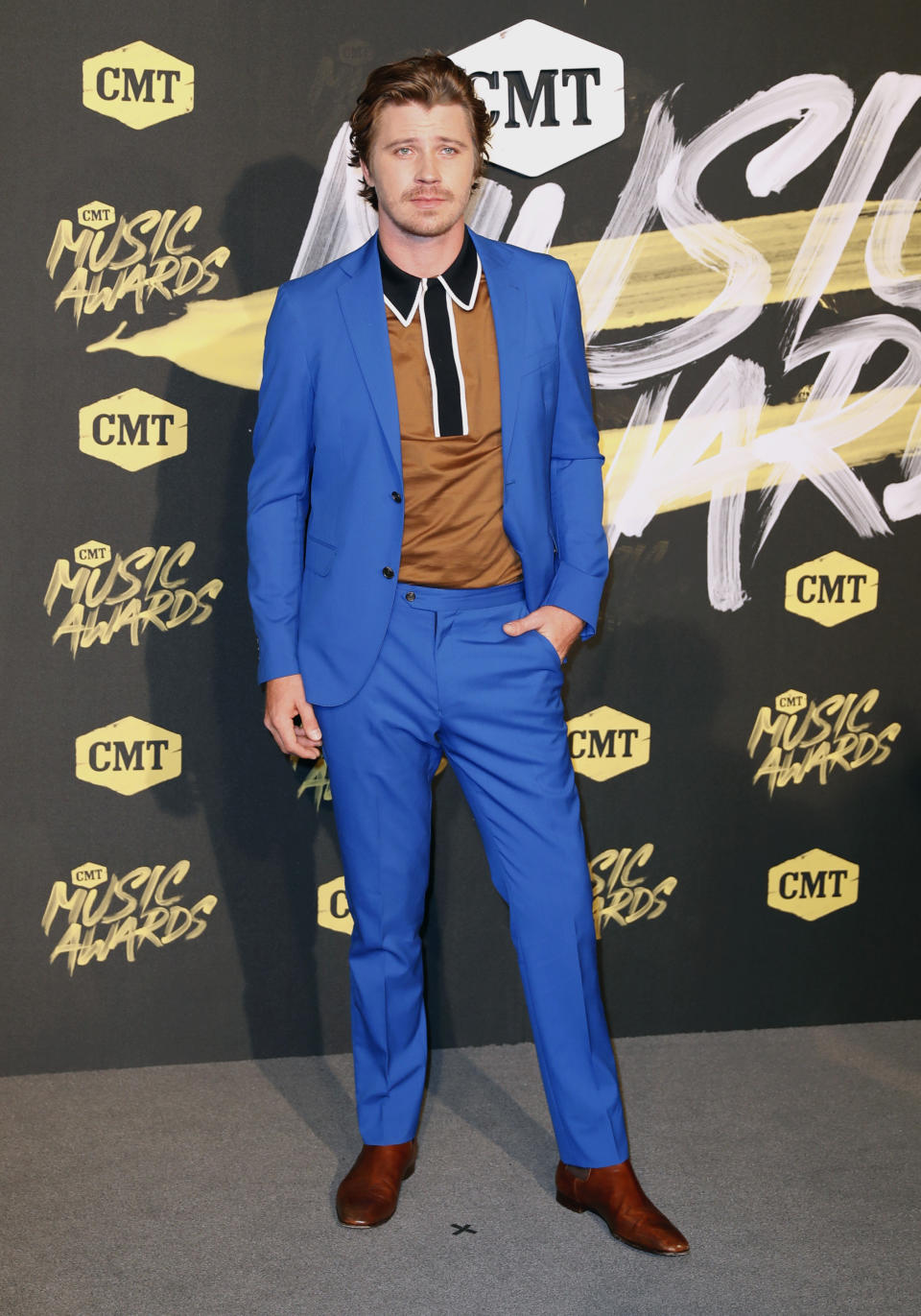 FILE - Garrett Hedlund arrives at the CMT Music Awards on June 6, 2018, in Nashville, Tenn. Hedlund turns 37 on Sept. 3. (AP Photo/Al Wagner, File)