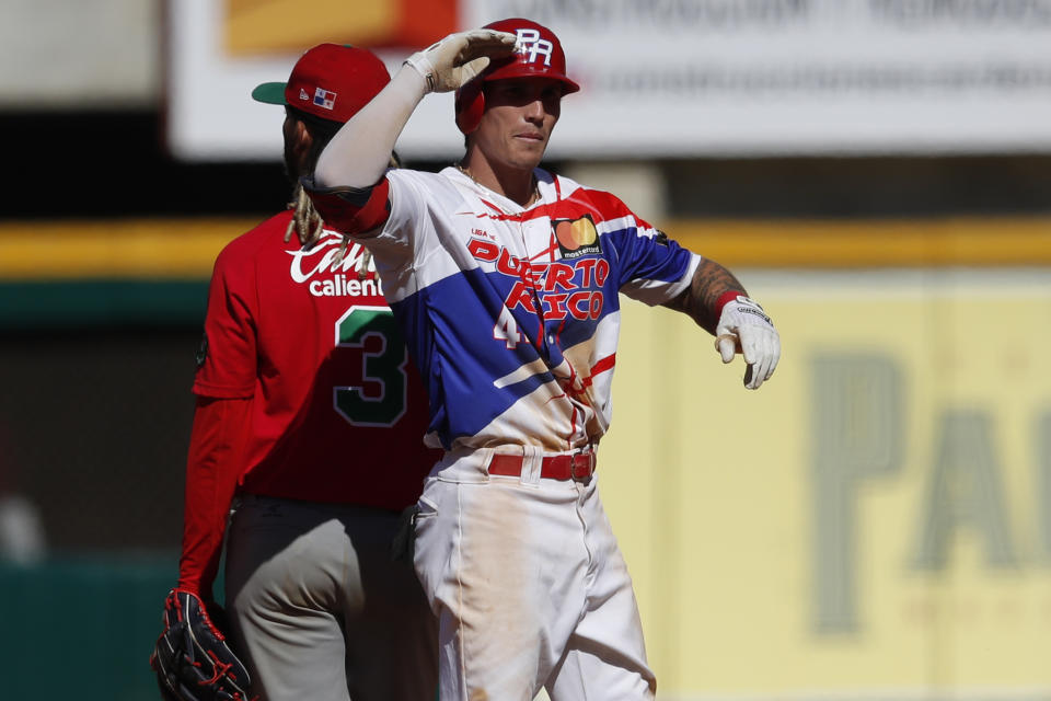 Jarren Durán, de Puerto Rico, festeja luego de conectar un doble ante Panamá en un juego de la Serie del Caribe, disputado el jueves 4 de febrero de 2021, en Mazatlán, México (AP Foto/Moisés Castillo)