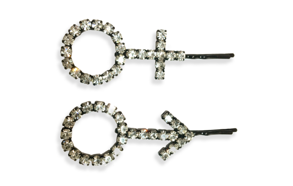 <p>Sex Symbol Hair Pins, $75, <a rel="nofollow noopener" href="http://ashleywilliamslondon.com" target="_blank" data-ylk="slk:ashleywilliamslondon.com;elm:context_link;itc:0;sec:content-canvas" class="link ">ashleywilliamslondon.com</a>. </p>