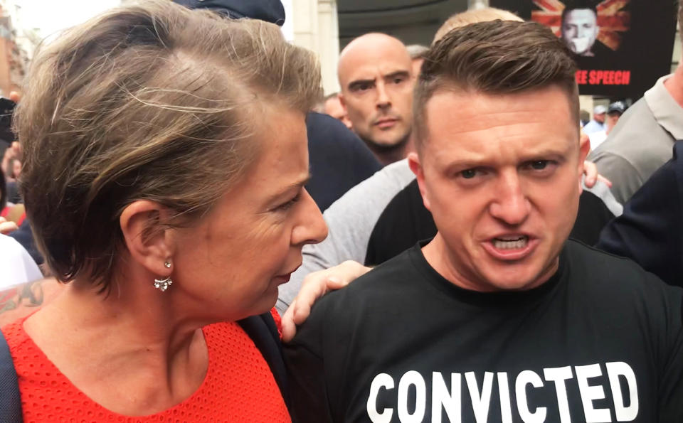 Tommy Robinson with Katy Hopkins as he arrives for his sentencing at the Old Bailey in London.