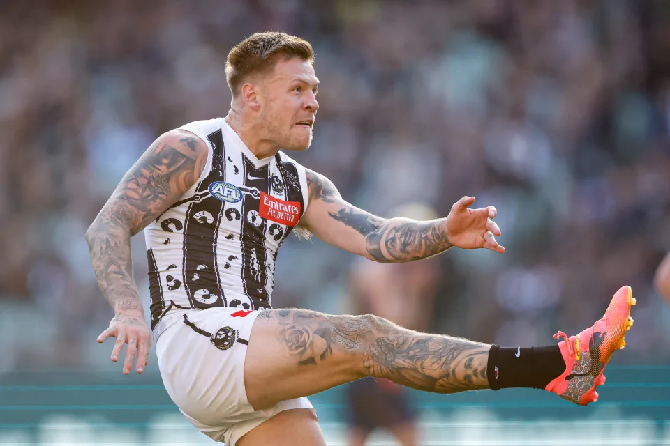 MELBOURNE, AUSTRALIA - MAY 18: Jordan De Goey of the Magpies kicks the ball during the 2024 AFL Round 10 match between The Collingwood Magpies and Kuwarna (Adelaide Crows) at The Melbourne Cricket Ground on May 18, 2024 in Melbourne, Australia. (Photo by Dylan Burns/AFL Photos via Getty Images)