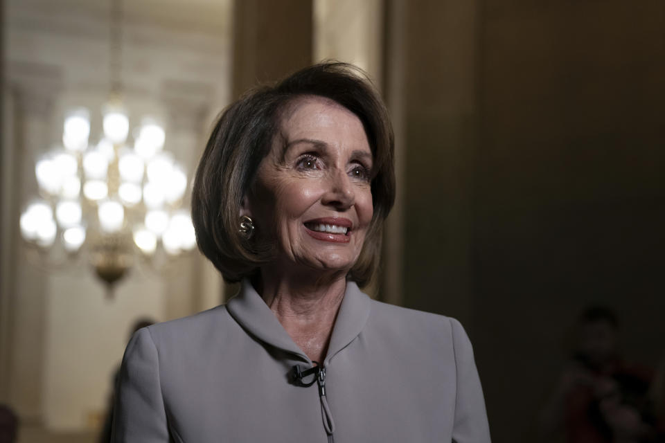 House Democratic Leader Nancy Pelosi of California, who will become speaker of the House on Thursday, walks to her new office at the Capitol during a television interview for the NBC Today Show, in Washington, Wednesday, Jan. 2, 2019. The Republicans will relinquish the majority to House Democrats under the leadership of Nancy Pelosi beginning a new era of divided government. (AP Photo/J. Scott Applewhite)